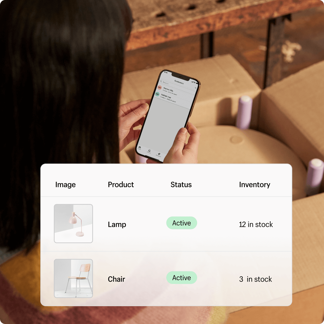 A merchant manages their store via the Shopify mobile app.